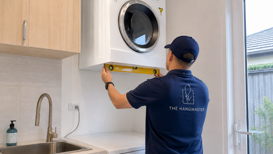 Wall-mounted dryer installation