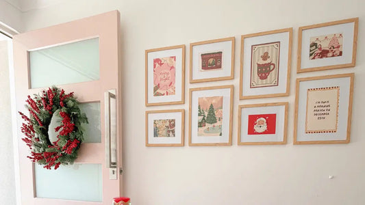 Arrange Gallery Wall Frames in Your Home Hanging Man (The Hangmaster)