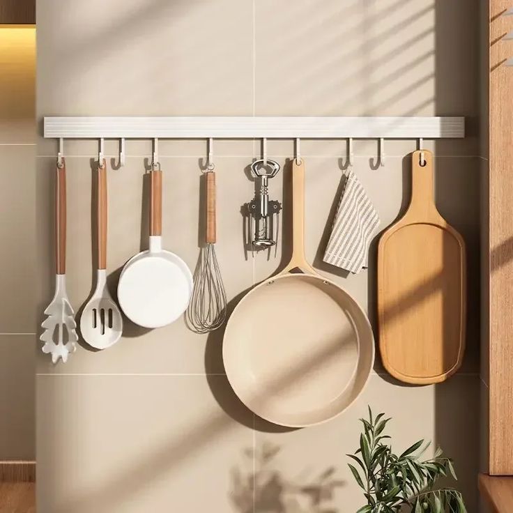 Kitchen tools hanging on a wall-mounted rack