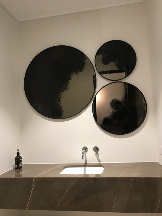 Mirror fitting in washroom